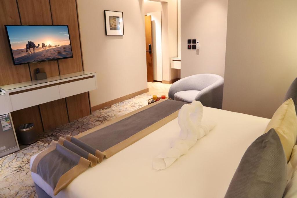 TV a/nebo společenská místnost v ubytování Ramadi Hotel