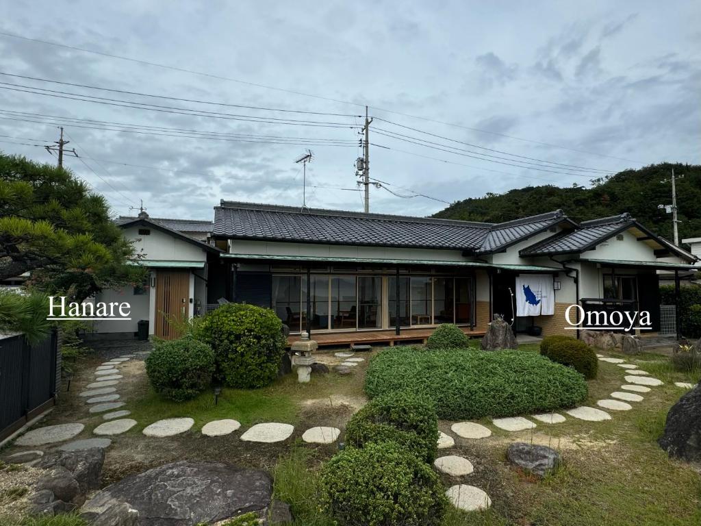 直島町にあるVacation House YOKOMBOの前庭付きの家
