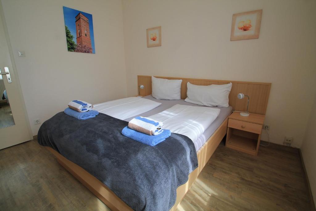 Postel nebo postele na pokoji v ubytování Haus Nordmeer