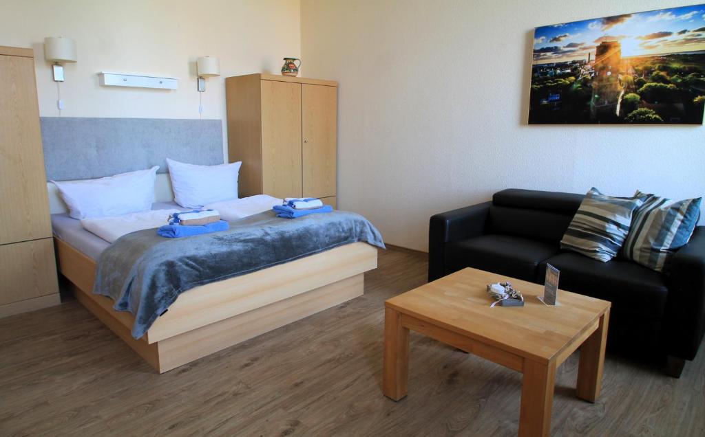 Postel nebo postele na pokoji v ubytování Haus Nordmeer