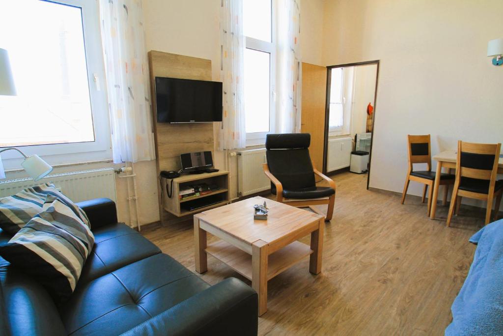 TV a/nebo společenská místnost v ubytování Haus Nordmeer