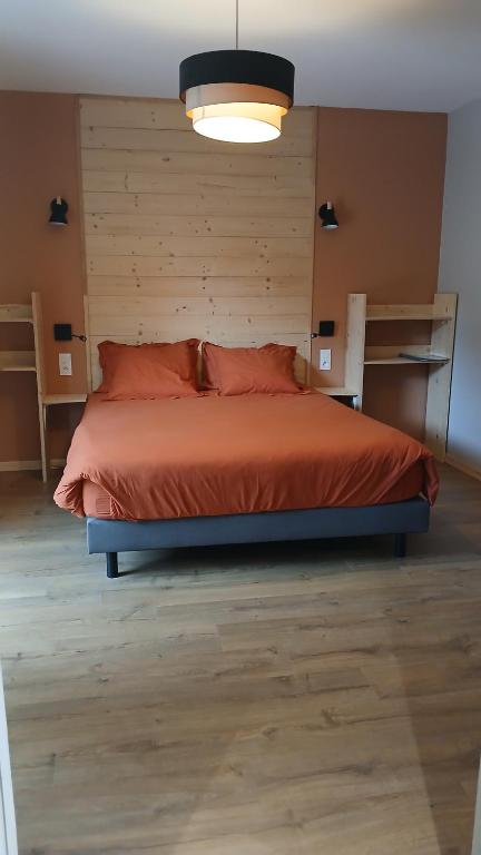 Postel nebo postele na pokoji v ubytování Aux Buis Gourmands