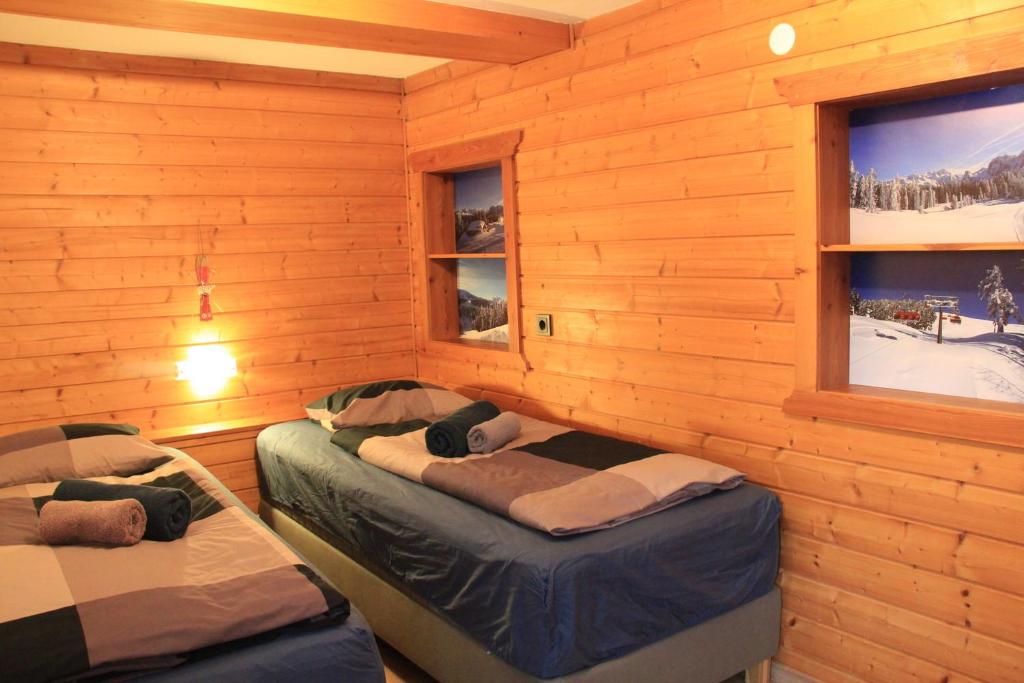 Postel nebo postele na pokoji v ubytování Apartments Gamsfeld