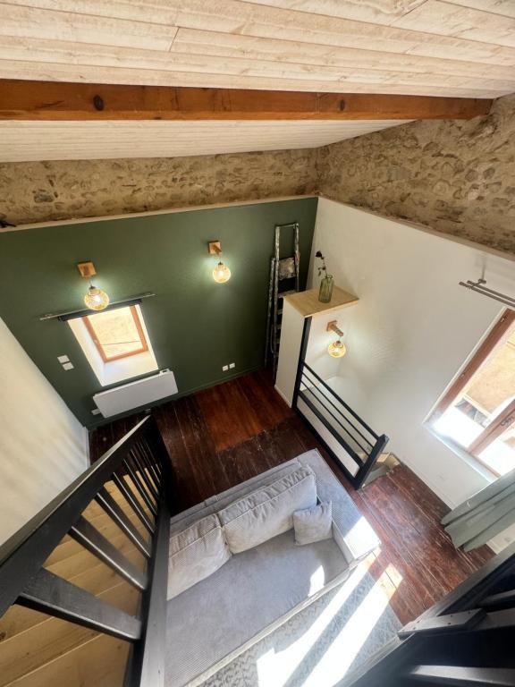 Postel nebo postele na pokoji v ubytování La Maisonnette