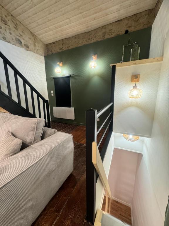 Postel nebo postele na pokoji v ubytování La Maisonnette
