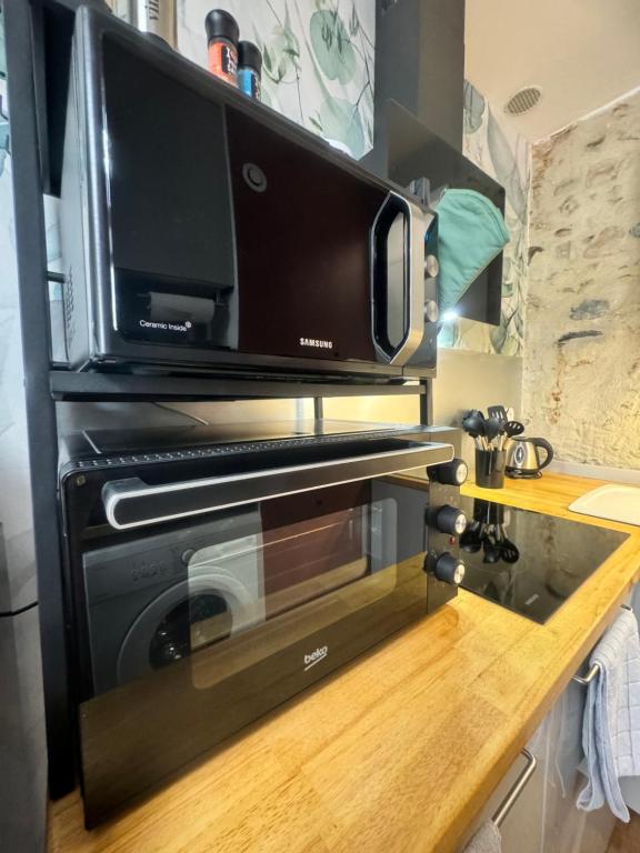 Kuchyň nebo kuchyňský kout v ubytování La Maisonnette