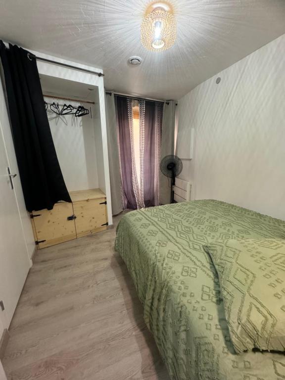 Postel nebo postele na pokoji v ubytování La Maisonnette