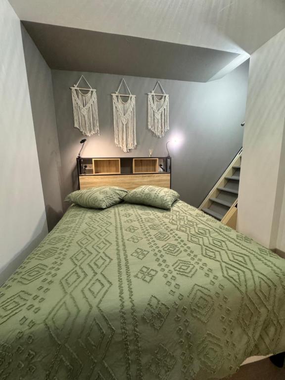 Postel nebo postele na pokoji v ubytování La Maisonnette