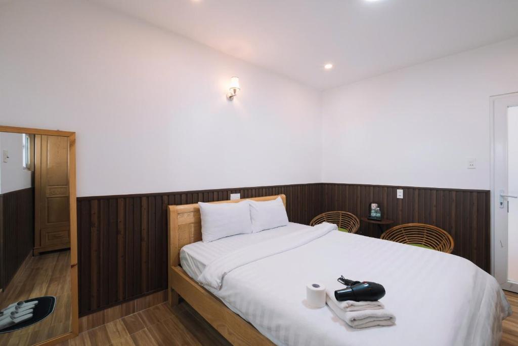 Giường trong phòng chung tại Cherry House Đà Lạt