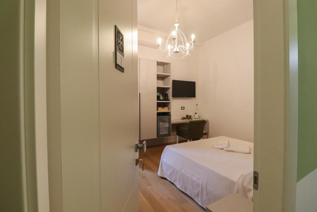 TV a/nebo společenská místnost v ubytování Re Di Rhome Guest House