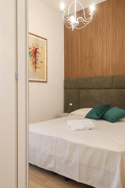 Postel nebo postele na pokoji v ubytování Re Di Rhome Guest House