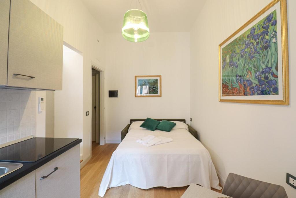 Postel nebo postele na pokoji v ubytování Re Di Rhome Guest House