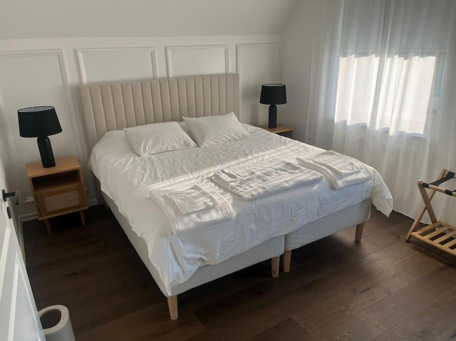 Postel nebo postele na pokoji v ubytování Peacefull Oasis in Helsingborg