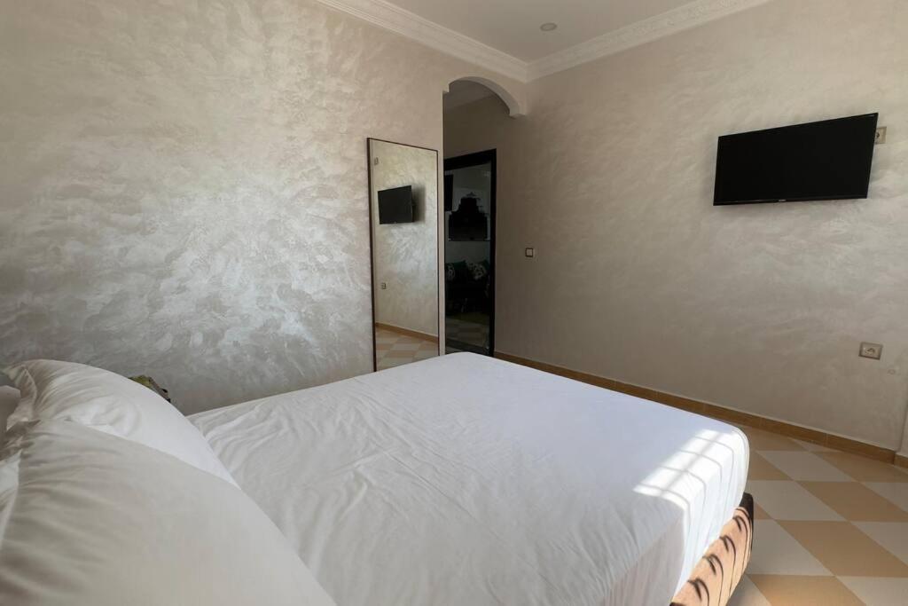 Postel nebo postele na pokoji v ubytování Cosy Appartement in Tiznit