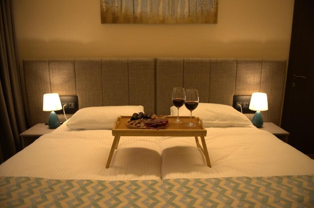 Postel nebo postele na pokoji v ubytování Hotel Takara