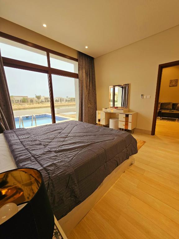 Postel nebo postele na pokoji v ubytování Luxury Villa with Private Pool and Lagoon view