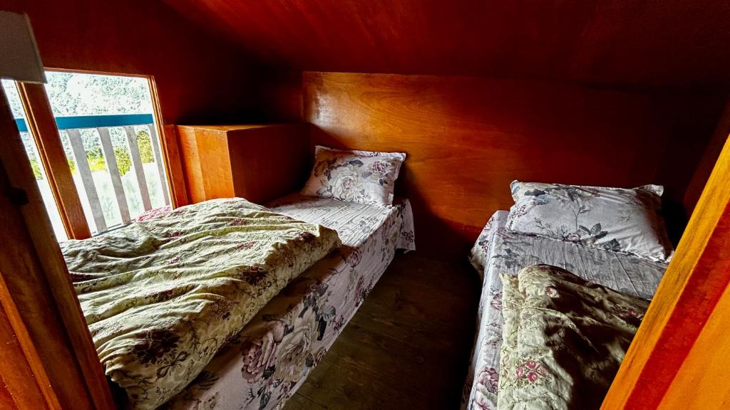 Postel nebo postele na pokoji v ubytování Lama Homestay