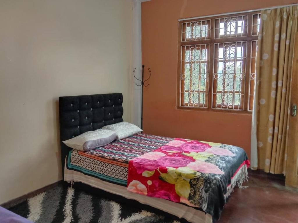 Postel nebo postele na pokoji v ubytování Shane HomeStay