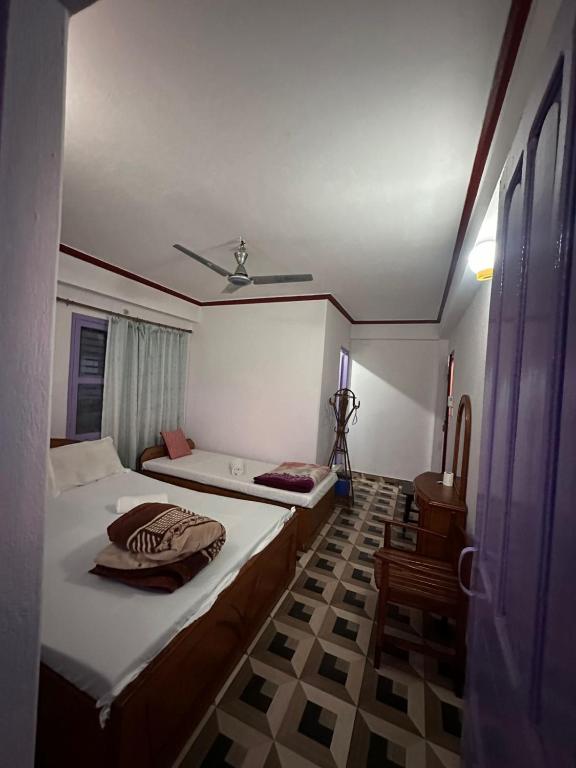 Letto o letti in una camera di Hotel Harmony
