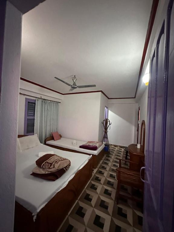 Letto o letti in una camera di Hotel Harmony