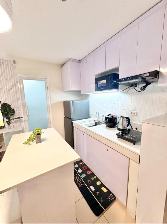 Kuchyň nebo kuchyňský kout v ubytování COZYTEL Centro