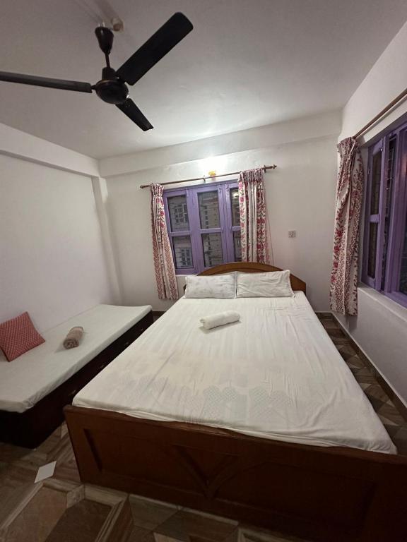 Letto o letti in una camera di Hotel Harmony