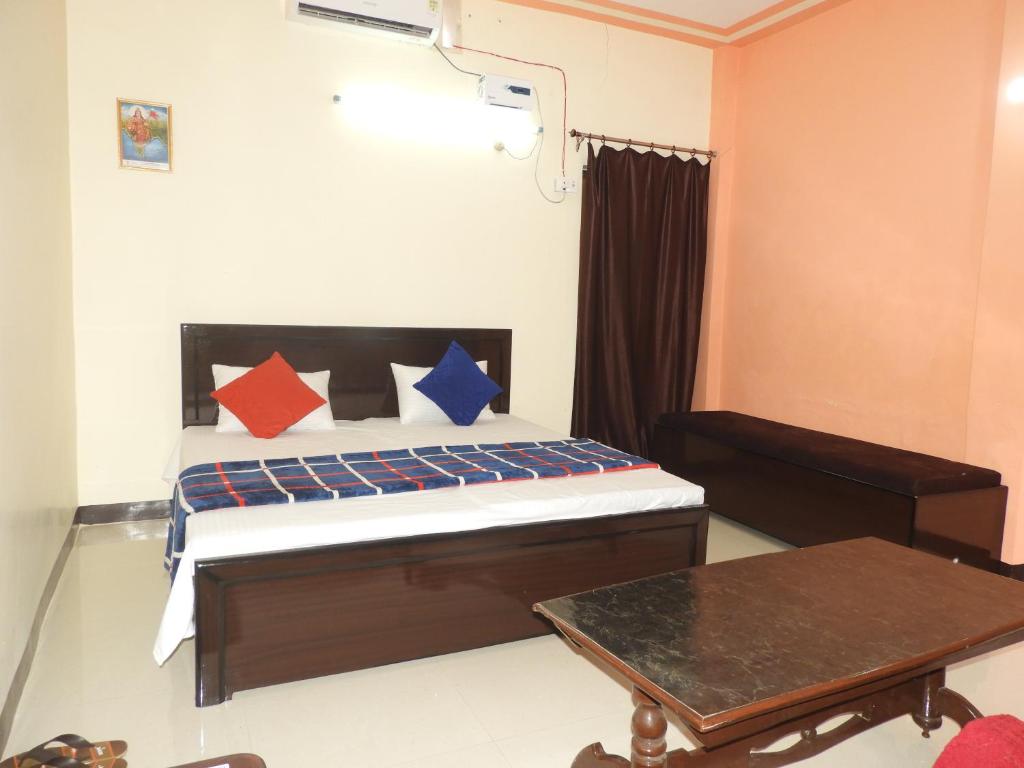 Postel nebo postele na pokoji v ubytování Samar Homestay