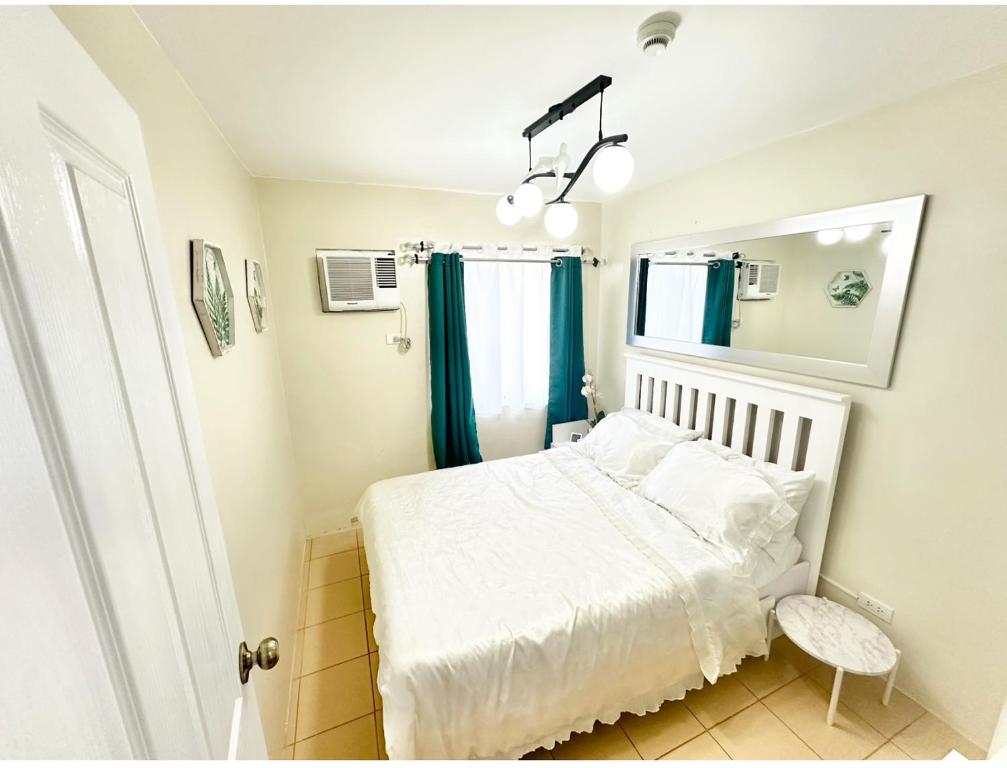 Postel nebo postele na pokoji v ubytování COZYTEL Centro