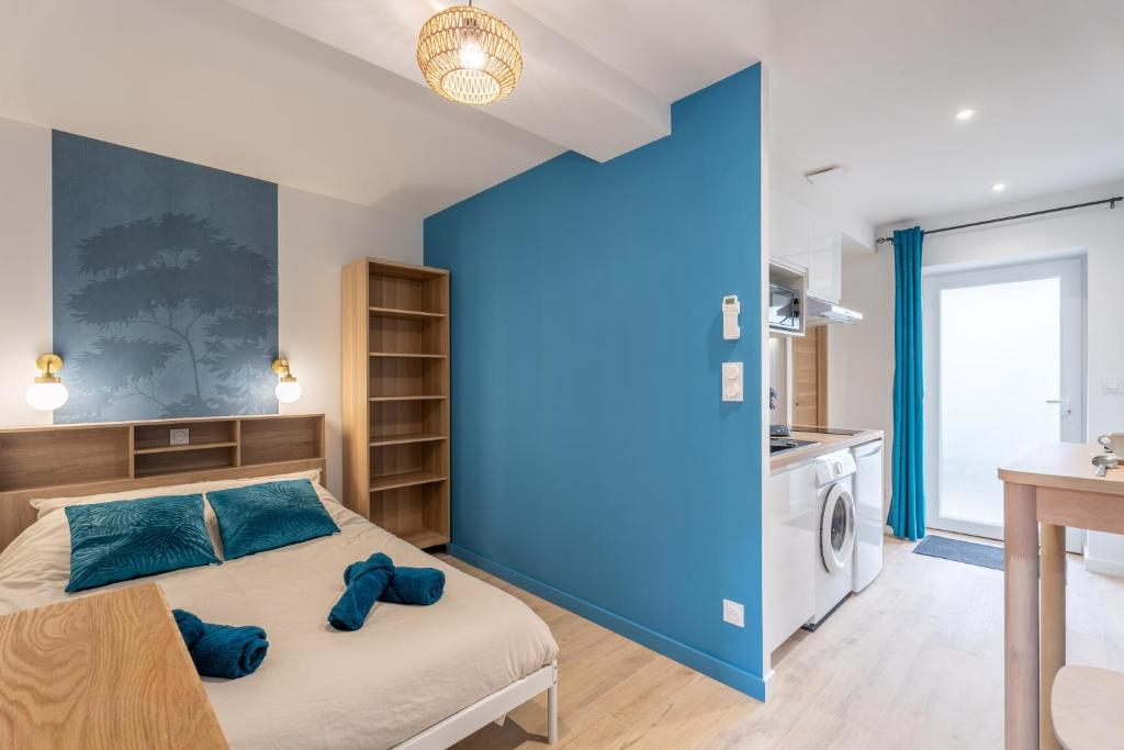 Postel nebo postele na pokoji v ubytování Charmant Studio bien équipé