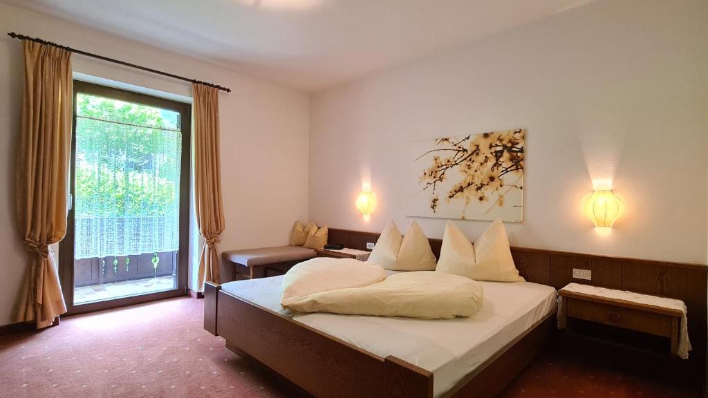 Postel nebo postele na pokoji v ubytování Appartments Innerhofer
