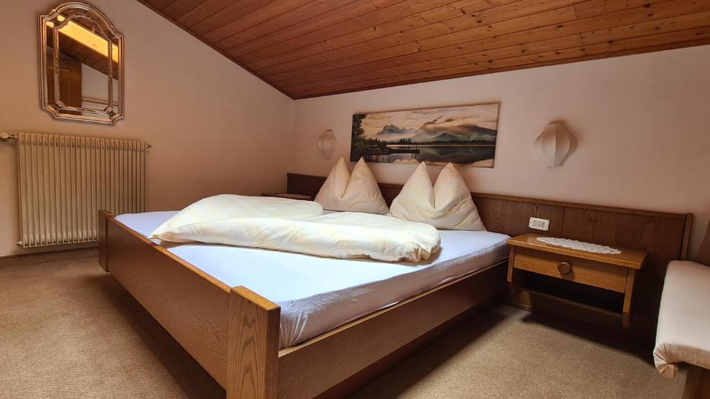 Postel nebo postele na pokoji v ubytování Appartments Innerhofer