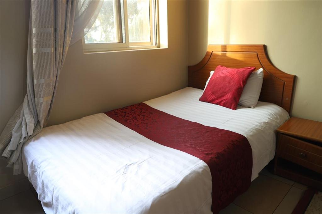 Postel nebo postele na pokoji v ubytování Hotel Intertropics