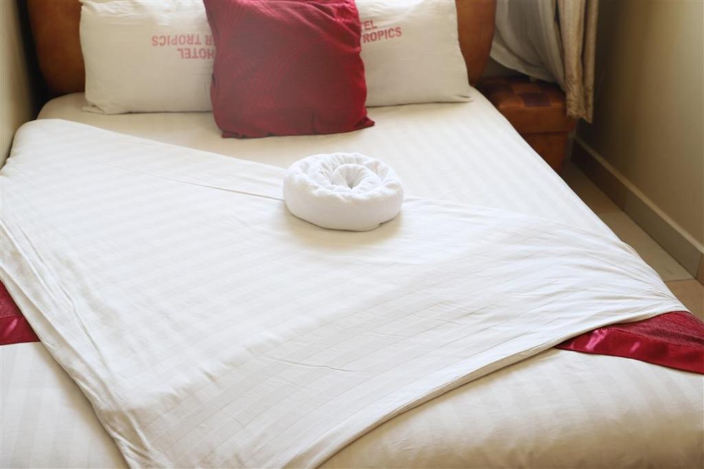 Postel nebo postele na pokoji v ubytování Hotel Intertropics