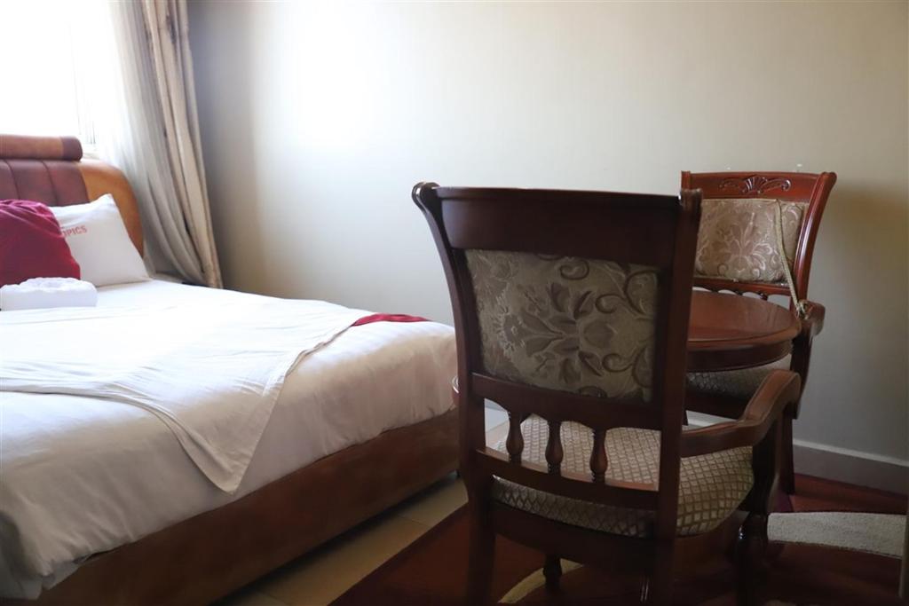 Postel nebo postele na pokoji v ubytování Hotel Intertropics