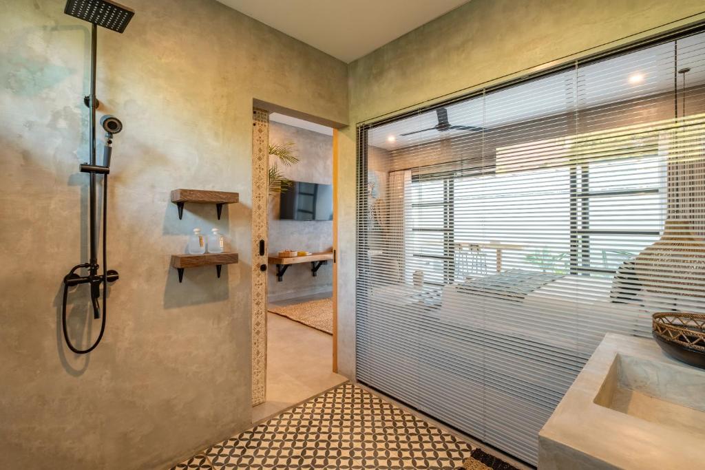 Postel nebo postele na pokoji v ubytování Ubud Lila Concept