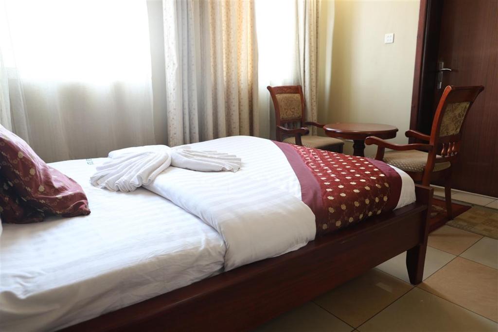 Postel nebo postele na pokoji v ubytování Hotel Intertropics