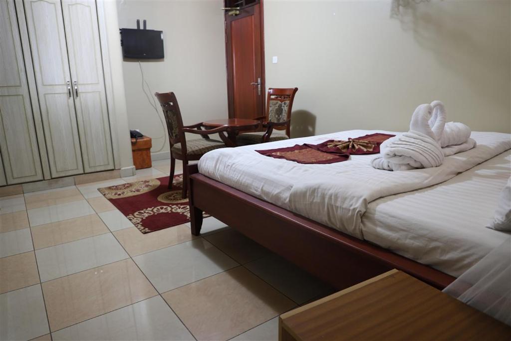 Postel nebo postele na pokoji v ubytování Hotel Intertropics
