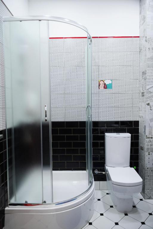 Koupelna v ubytování Emigrand Art Hotel