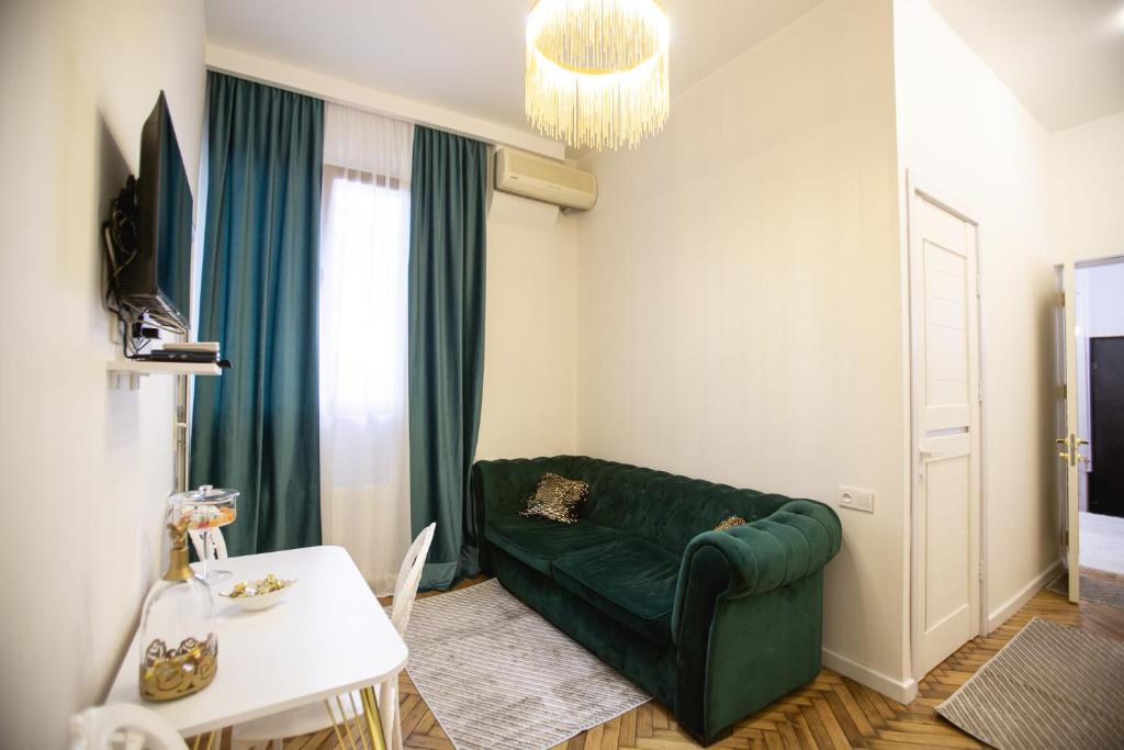 TV a/nebo společenská místnost v ubytování Golden Palace