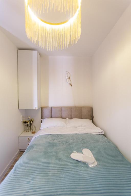 Postel nebo postele na pokoji v ubytování Golden Palace