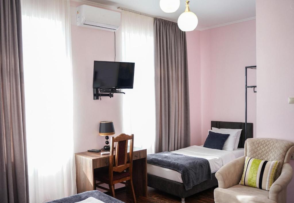TV a/nebo společenská místnost v ubytování Europa Hotel-Kutaisi