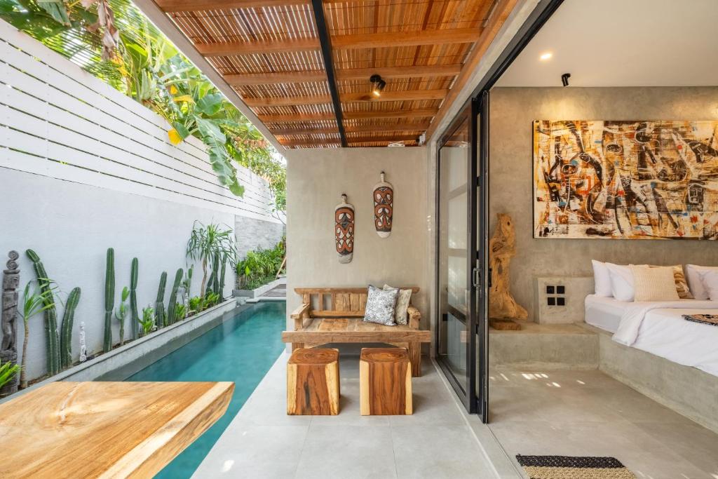 Postel nebo postele na pokoji v ubytování Ubud Lila Concept