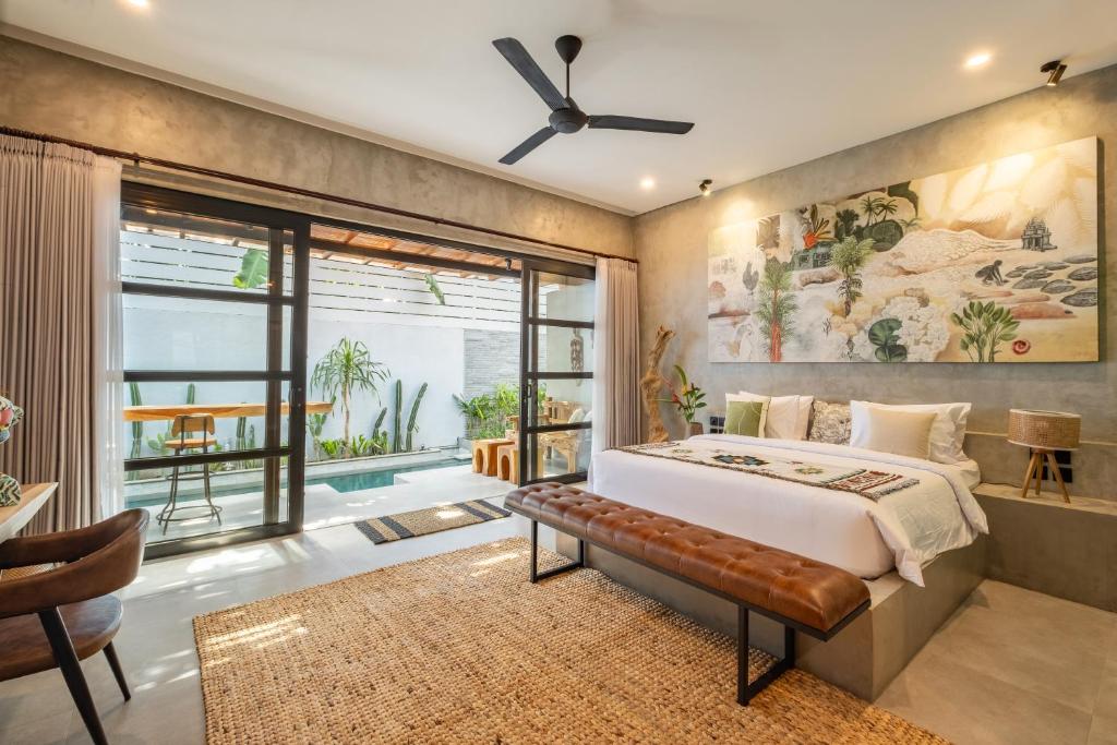 Postel nebo postele na pokoji v ubytování Ubud Lila Concept