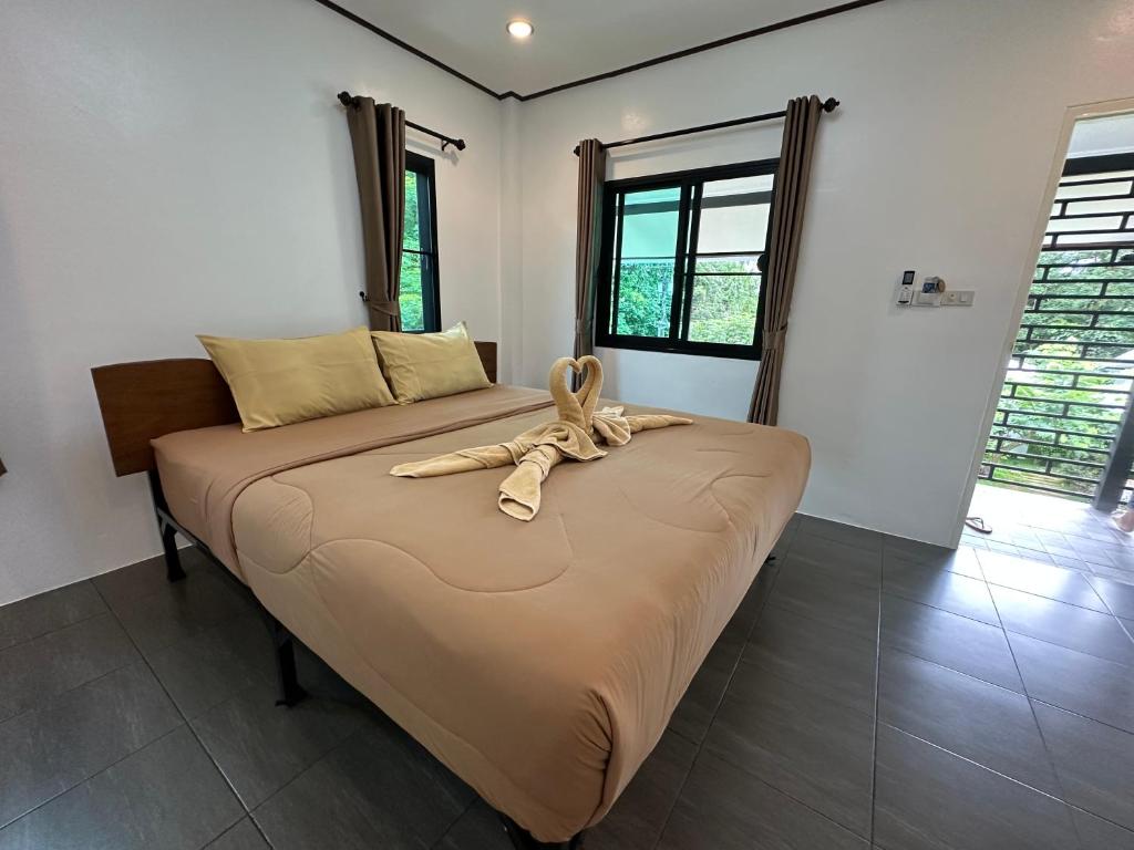 Postel nebo postele na pokoji v ubytování Hanoii House