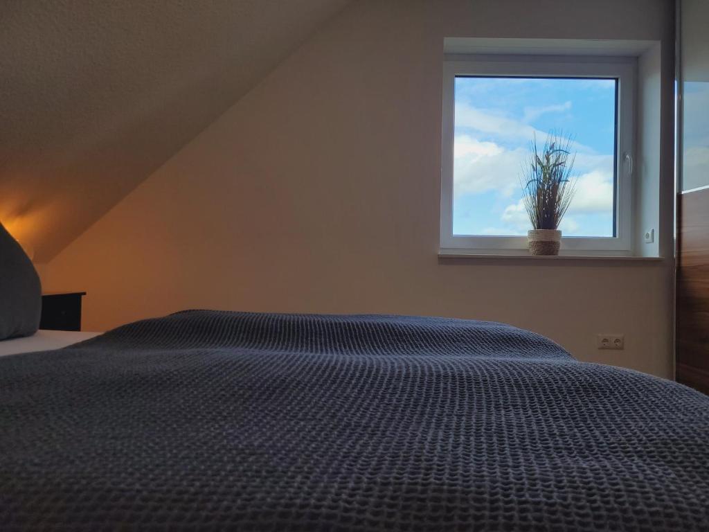 Postel nebo postele na pokoji v ubytování Wanger Meerbrise
