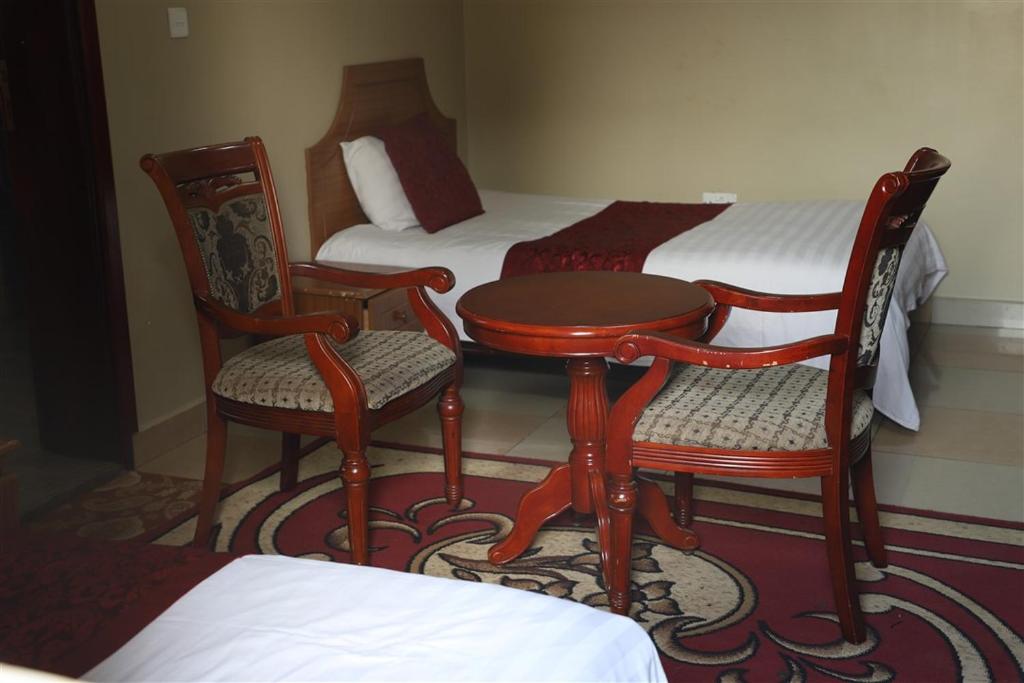 Postel nebo postele na pokoji v ubytování Hotel Intertropics