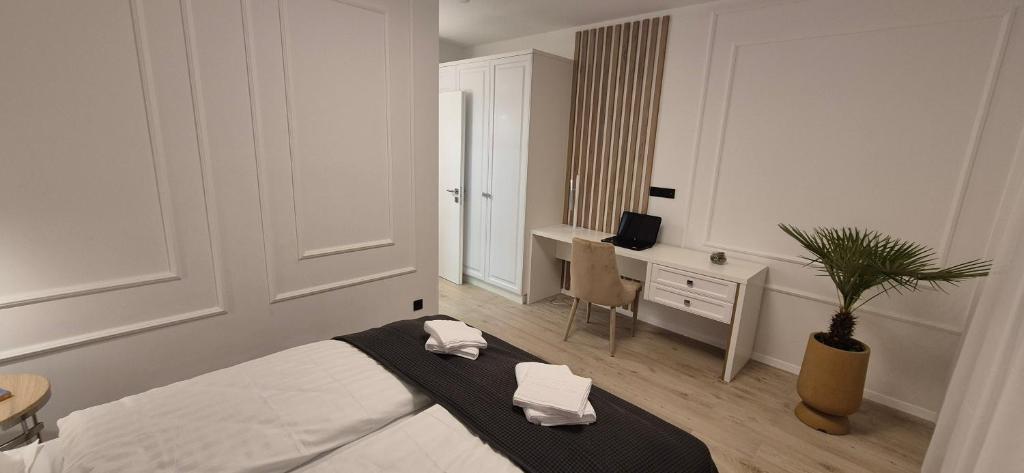 Postel nebo postele na pokoji v ubytování Anita's Mansion