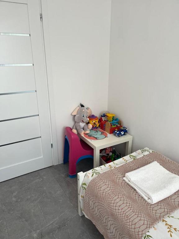Posteľ alebo postele v izbe v ubytovaní Apartament Szpitalna