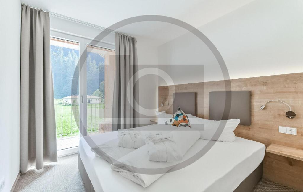 Posteľ alebo postele v izbe v ubytovaní Hochwertige Ferienwohnung
