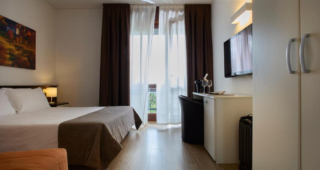 Postel nebo postele na pokoji v ubytování Hotel Eurorest